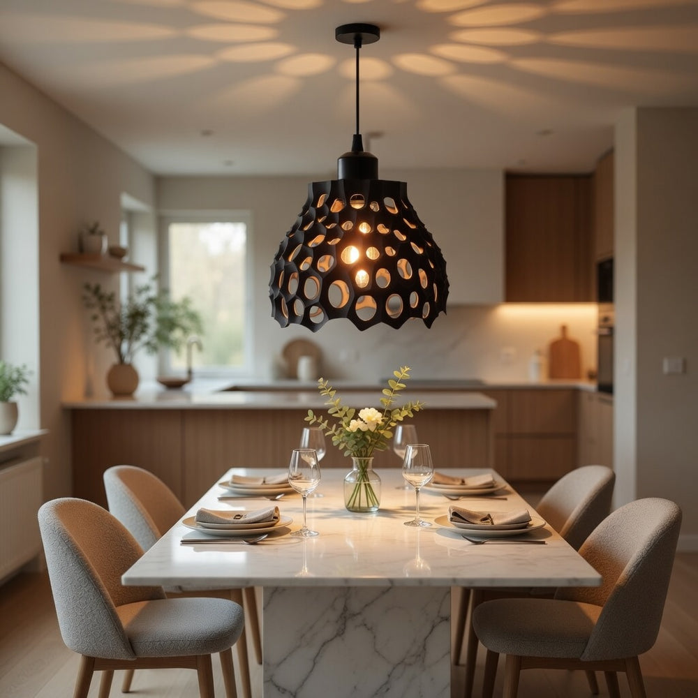 Dining room with marble table, chairs, and a modern pendant light.