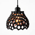 Black pendant light with a unique geometric design on a white background