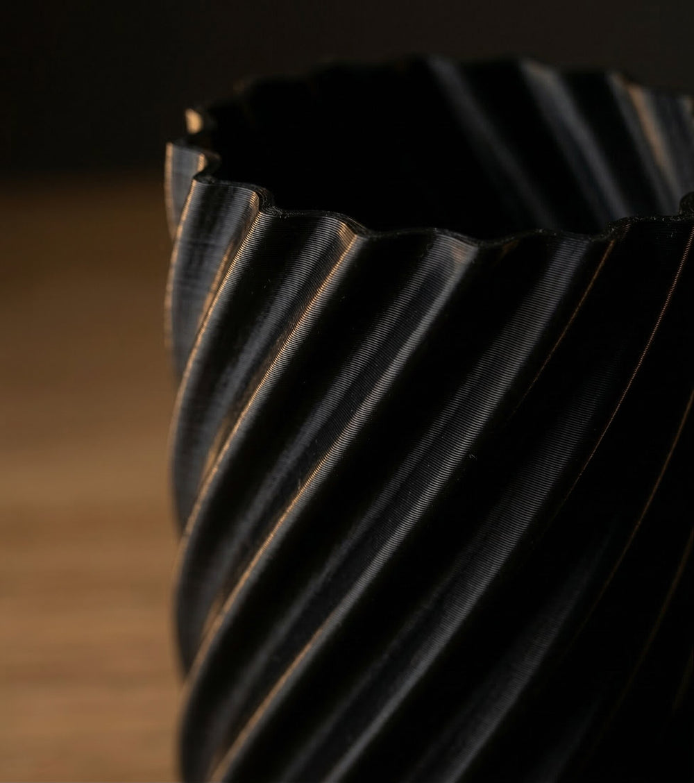 Close-up of a metal gear on a dark background