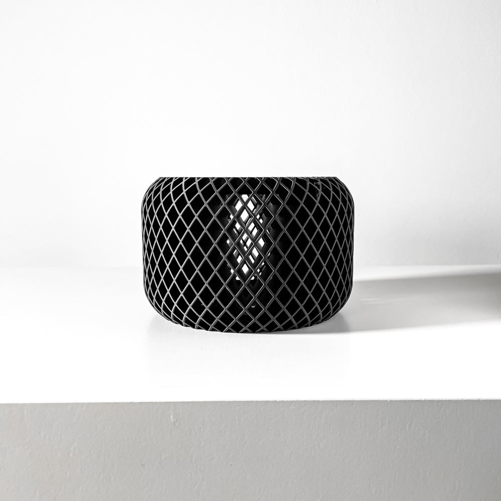 Black woven stool on a white background