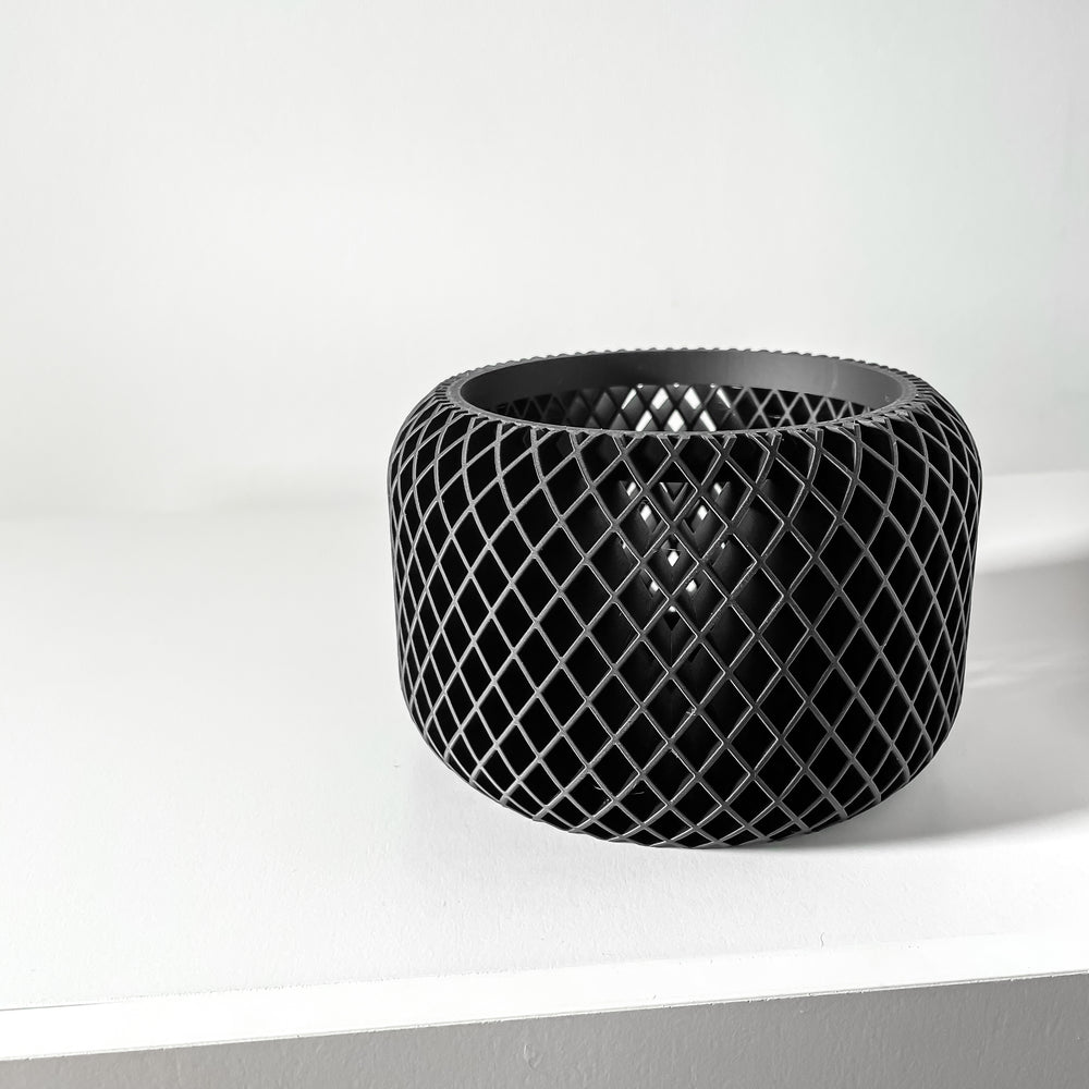 Black woven basket on a white background